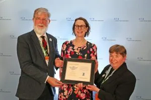 Laura Carter receives an award